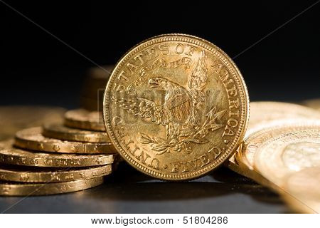 Five Dollars gold coins USD shallow depth of fiels