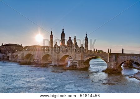 Stone Bridge Across The Ebro River At Zaragoza, Spain