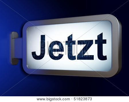 Time concept: Jetzt(german) on billboard background