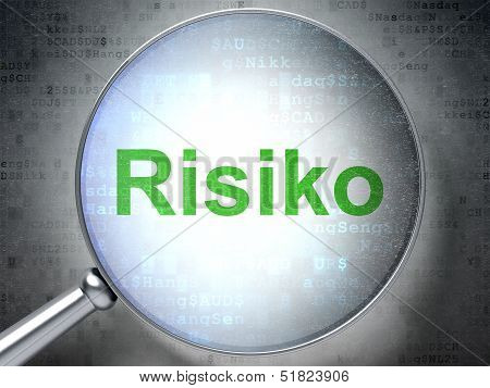 Business concept: Risiko (german) with optical glass on digital b