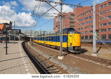 Train Leaving Dutch Station Of Amersfoort