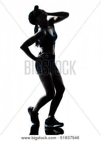 one caucasian woman runner jogger tired breathless in silhouette studio isolated on white background