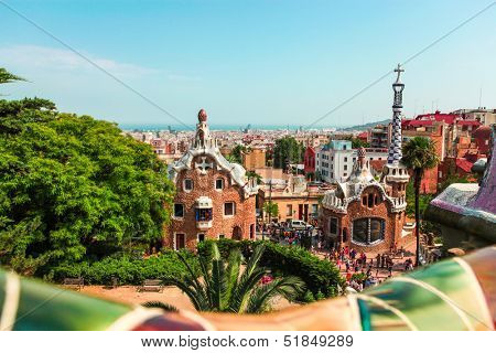 BARCELONA, SPAIN - JULY 19: Ceramic mosaic Park Guell on July 19, 2013 in Barcelona, Spain. Park Guell is the famous architectural town art designed by Antoni Gaudi and built in the years 1900 to 1914