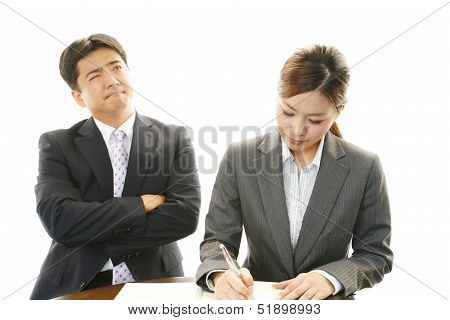 Dissatisfied businessman and businesswoman