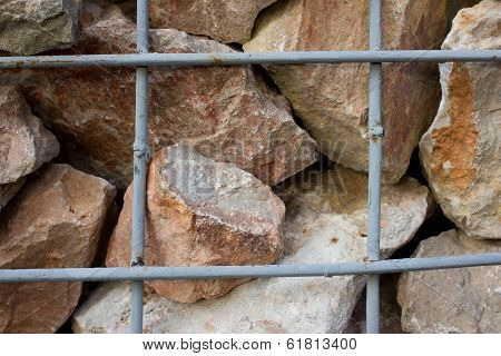 Background Granite Retaining Wall Reinforced With Steel Grid