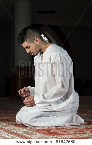 Young Muslim Guy Praying