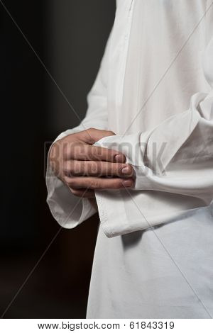 Close-up Of Male Hands Praying In Mosque