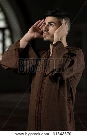 Young Muslim Guy Praying