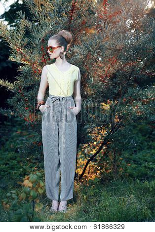 Glamor. Trendy Stylish Fashion Model In Elegant Pants Outdoors