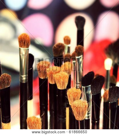 Close up view of different cosmetic brushes for makeup