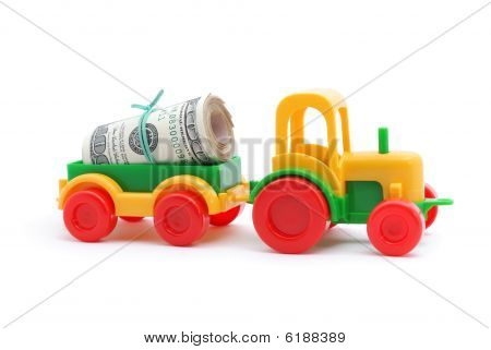 Das Spielzeug Traktor Beförderung Geld