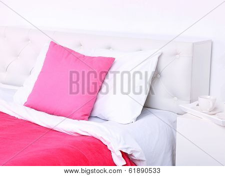Comfortable soft bed with pillows
