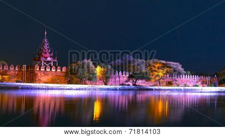 Night River. Mandalay Palace Bastion.