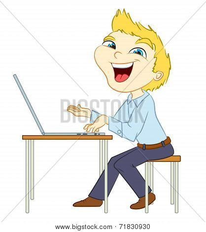 Smiling man types on a laptop