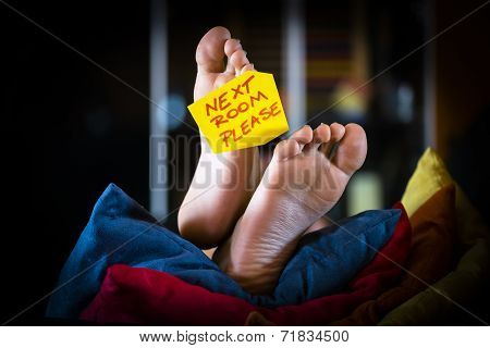 Feet On The Sofa With A Post Card