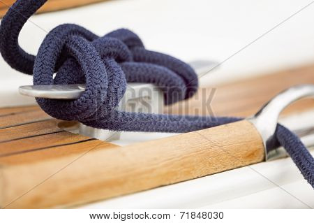 Sailing Ship Fixing His Rope