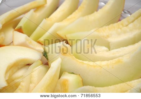 Orange Melon Sliced On The Plate