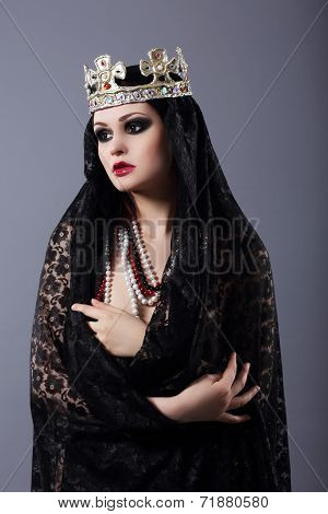 Witchcraft. Woman In Old-fashioned Clothes And Crown