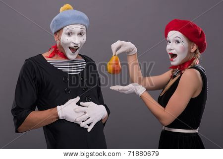 Portrait of funny mime couple with white faces and emotions isol