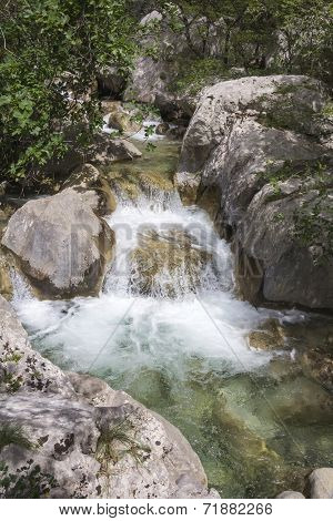 Small Waterfall On Mountain Stream