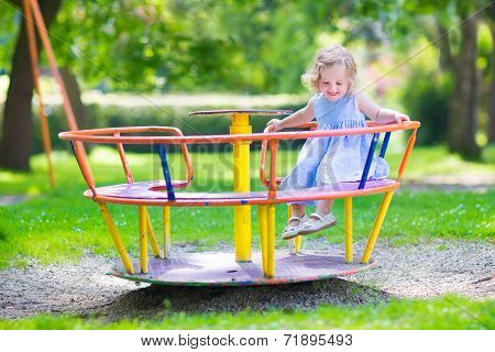 Little Girl On A Playground
