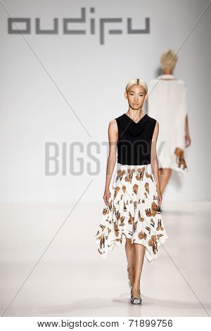 NEW YORK-SEP 8: A model walks the runway at the OUDIFU fashion show during Mercedes-Benz Fashion Week Spring/Summer 2015 at The Salon at Lincoln Center on September 8, 2014 in New York City.