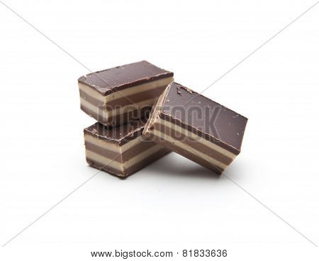 Chocolate Pieces On A White Background