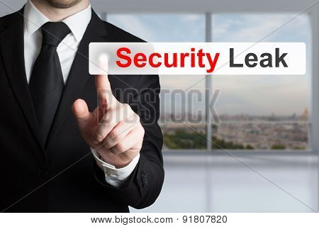 Businessman Pushing Touchscreen Security Leak