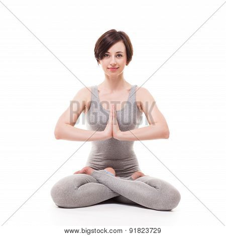 young beautiful woman yoga posing. isolated