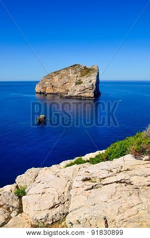 Peaceful Landscape View Of Ocean Coast And Rocky Island, Sardinia