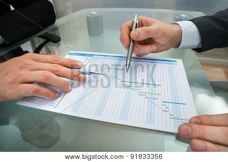 Two Businessmen Making Gantt Diagram