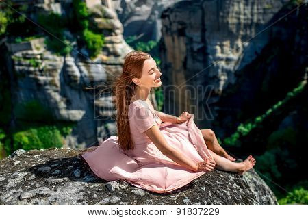 Woman enjoying nature on the mountains