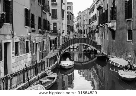 VENICE - SEP 12: Venice canal on September 12, 2014 in Venice, Italy. Venice is a city in northeastern Italy sited on a group of 118 small islands separated by canals and linked by bridges