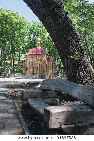 Chapel And A Bench In The Park. Dzerzhinsk, Ukraine