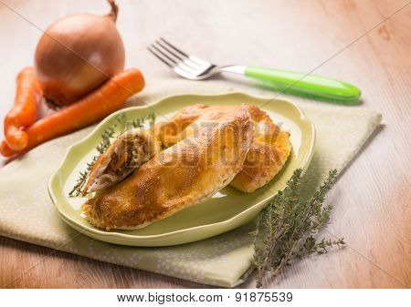 panzerotti with vegetables, selective focus