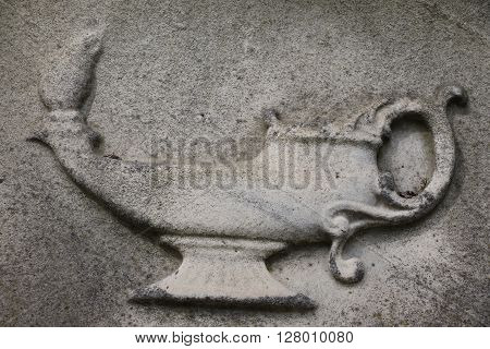 The magic lantern of Alladin in a grave of a cemetery in Paris