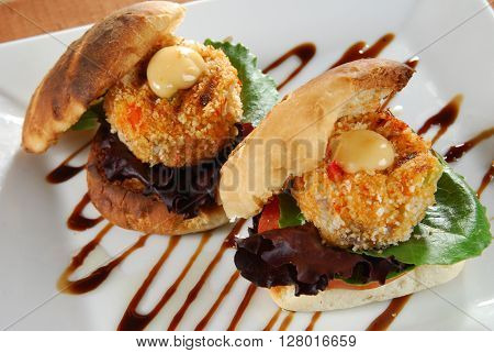 Overhead view of gourmet crab cake sandwiches