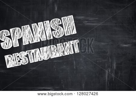Chalkboard background with chalk letters: Delicious spanish cuis