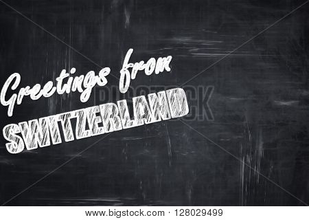 Chalkboard background with chalk letters: Greetings from switzer