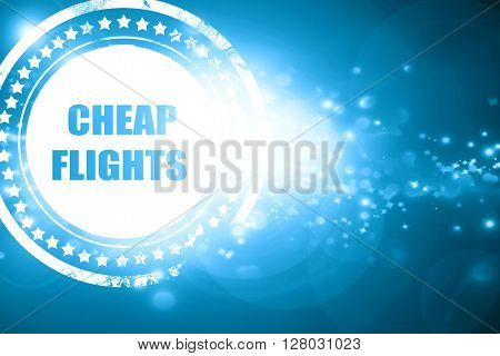 Blue stamp on a glittering background: cheap flight