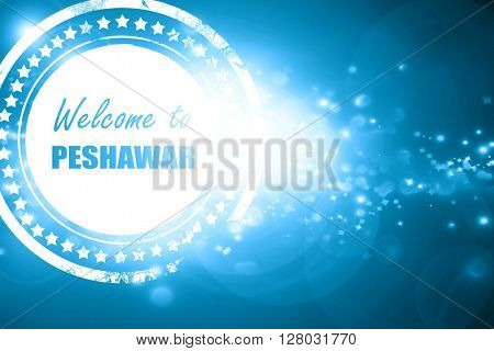Blue stamp on a glittering background: Welcome to peshawar