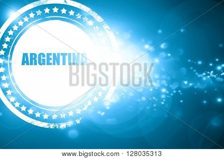 Blue stamp on a glittering background: Greetings from argentine