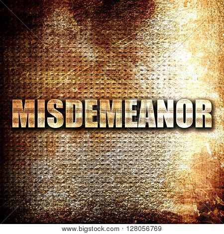 misdemeanor, written on vintage metal texture