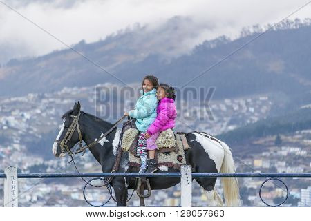 Two Girls Riding A Horse Quito Ecuador