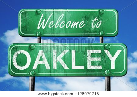 oakley vintage green road sign with blue sky background