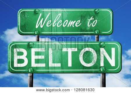 belton vintage green road sign with blue sky background