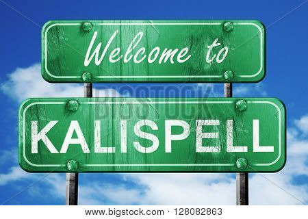 kalispell vintage green road sign with blue sky background