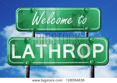 lathrop vintage green road sign with blue sky background
