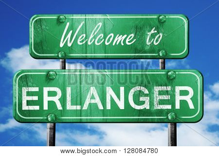 erlanger vintage green road sign with blue sky background