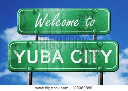 yuba city vintage green road sign with blue sky background